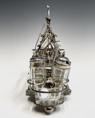 Lot 112 - An epns breakfast stand for three the central...