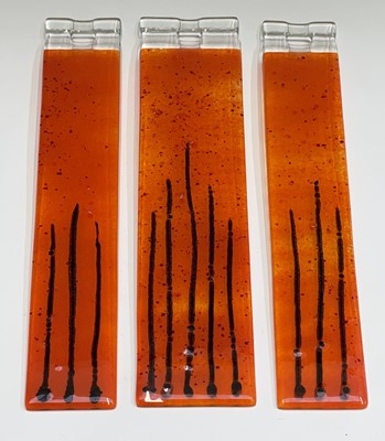 Lot 977 - Three studio glass panels, with streaked...