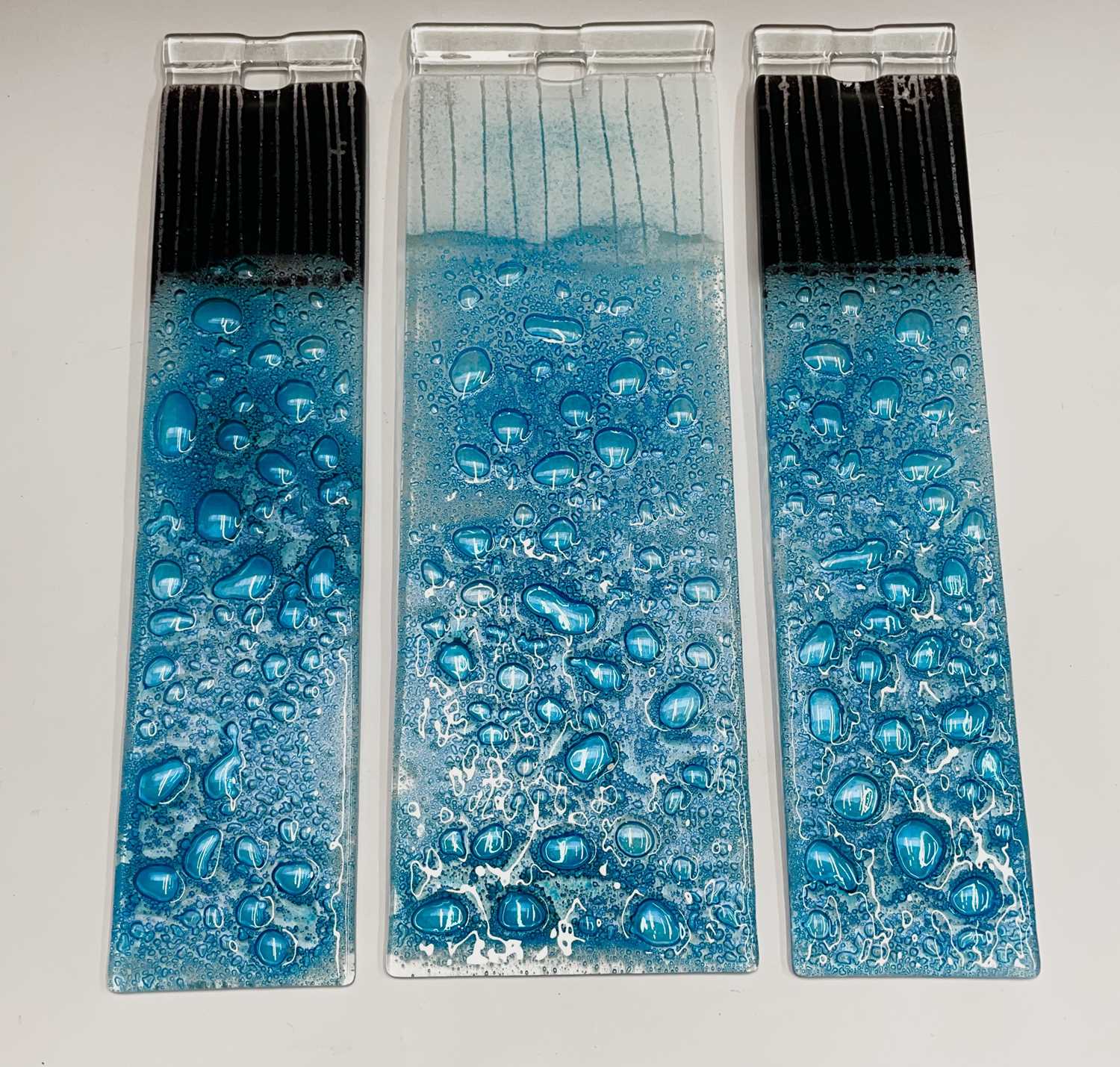Lot 978 - Three studio glass panels, with blue