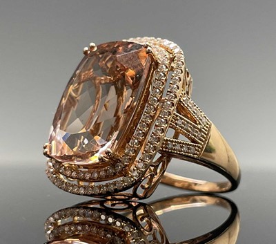 A desirable morganite ring with a rectangular...