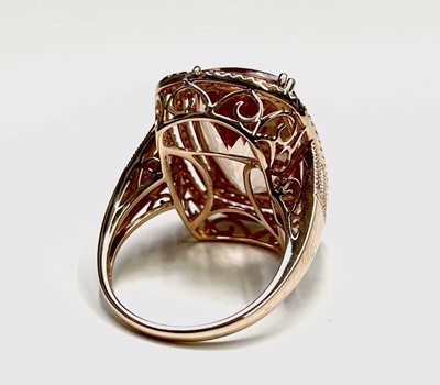 A desirable morganite ring with a rectangular...