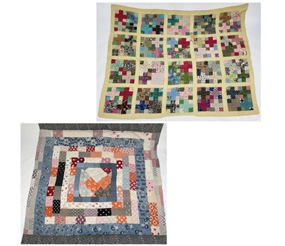 Lot 2855 - Patchwork quilts. One quilt with predominantly...