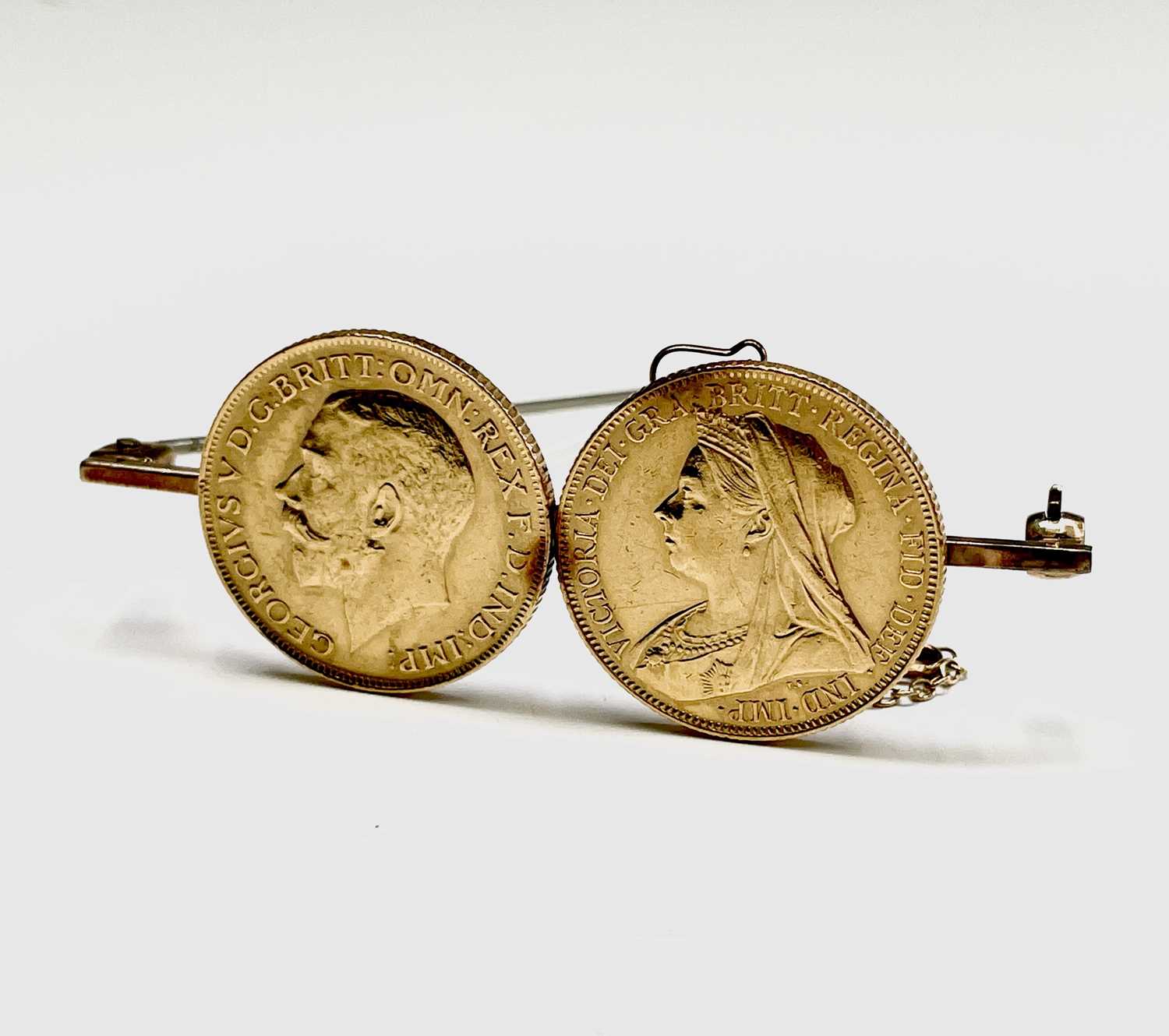 Lot 345 - Two gold sovereigns mounted on a 9ct gold...