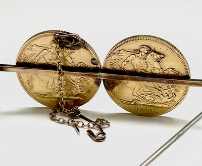 Lot 345 - Two gold sovereigns mounted on a 9ct gold...