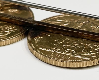 Lot 345 - Two gold sovereigns mounted on a 9ct gold...