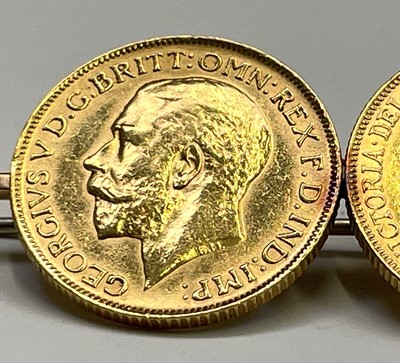 Lot 345 - Two gold sovereigns mounted on a 9ct gold...