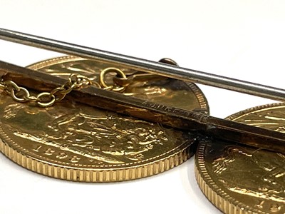 Lot 345 - Two gold sovereigns mounted on a 9ct gold...