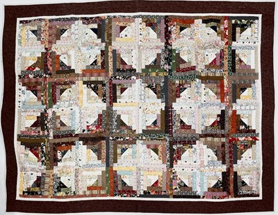 Lot 2856 - A fine patchwork quilt of rectagular,...