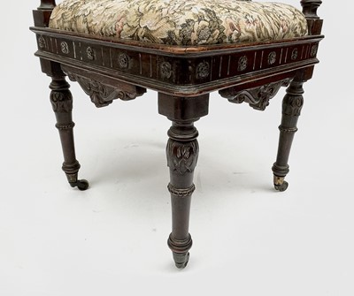 Lot 3223 - An Italian Renaissance carved oak corner chair,...