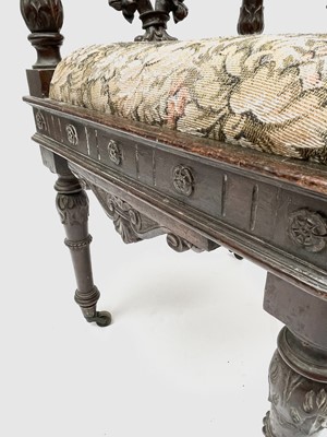 Lot 3223 - An Italian Renaissance carved oak corner chair,...