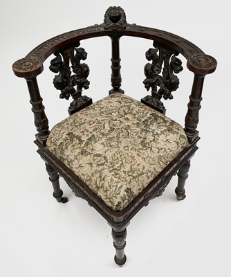 Lot 3223 - An Italian Renaissance carved oak corner chair,...
