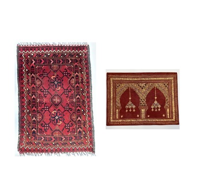 Lot 1035 - An Arabic red leather folder, marked 'DR 22...