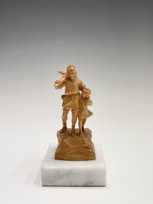 Lot 467 - A Black Forest carved limewood figure of...