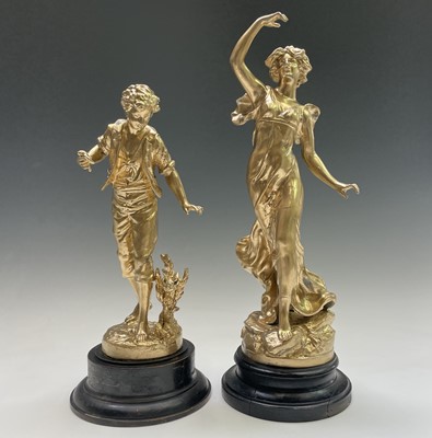 Lot 455 - A French gilt spelter figure of a lady, signed...