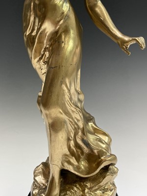 Lot 455 - A French gilt spelter figure of a lady, signed...