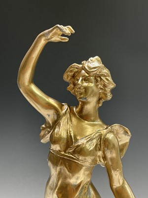 Lot 455 - A French gilt spelter figure of a lady, signed...