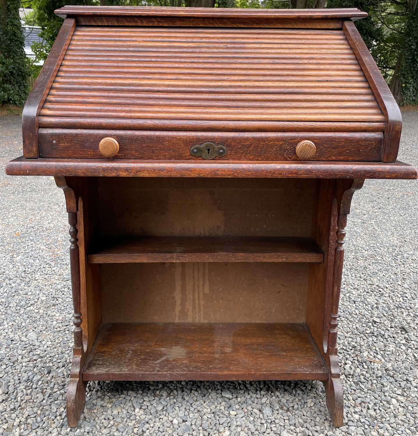 Lot 3225 - An oak roll top desk, height 101cm, width 72cm,...