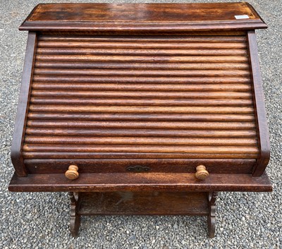 Lot 3225 - An oak roll top desk, height 101cm, width 72cm,...