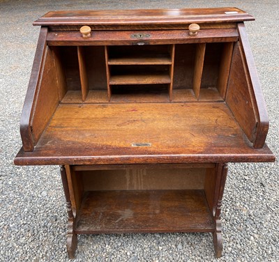 Lot 3225 - An oak roll top desk, height 101cm, width 72cm,...