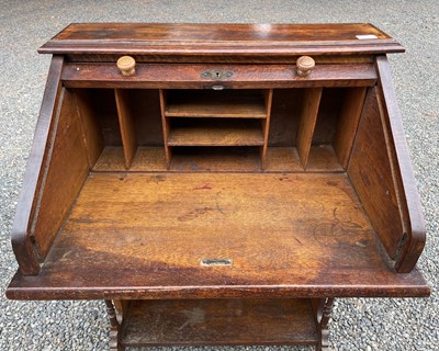 Lot 3225 - An oak roll top desk, height 101cm, width 72cm,...