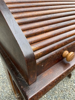 Lot 3225 - An oak roll top desk, height 101cm, width 72cm,...