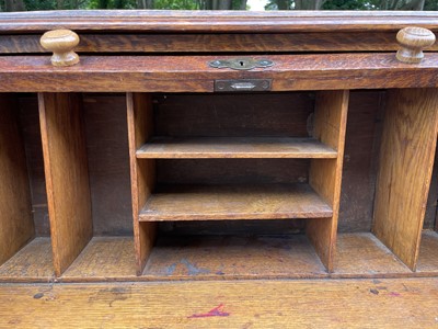 Lot 3225 - An oak roll top desk, height 101cm, width 72cm,...