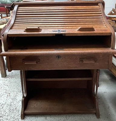 Lot 3226 - An oak roll top desk, height 102cm, width 76cm,...