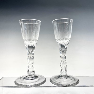 Lot 925 - A pair of 18th century cordial glasses, with...