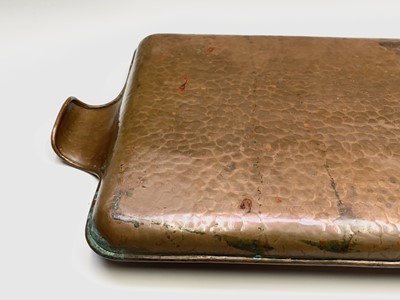 Lot 142 - An Arts and Crafts planished copper tray,...