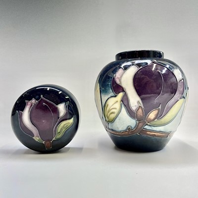 Lot 828 - A Moorcroft 'Wine Magnolia' pattern ginger jar,...