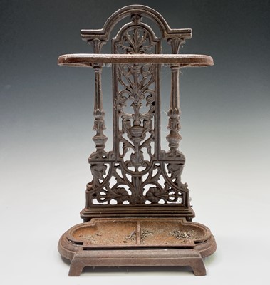 Lot 486 - A cast iron umbrella stand. Height 50cm, width...