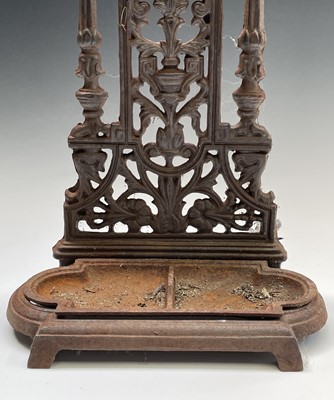 Lot 486 - A cast iron umbrella stand. Height 50cm, width...