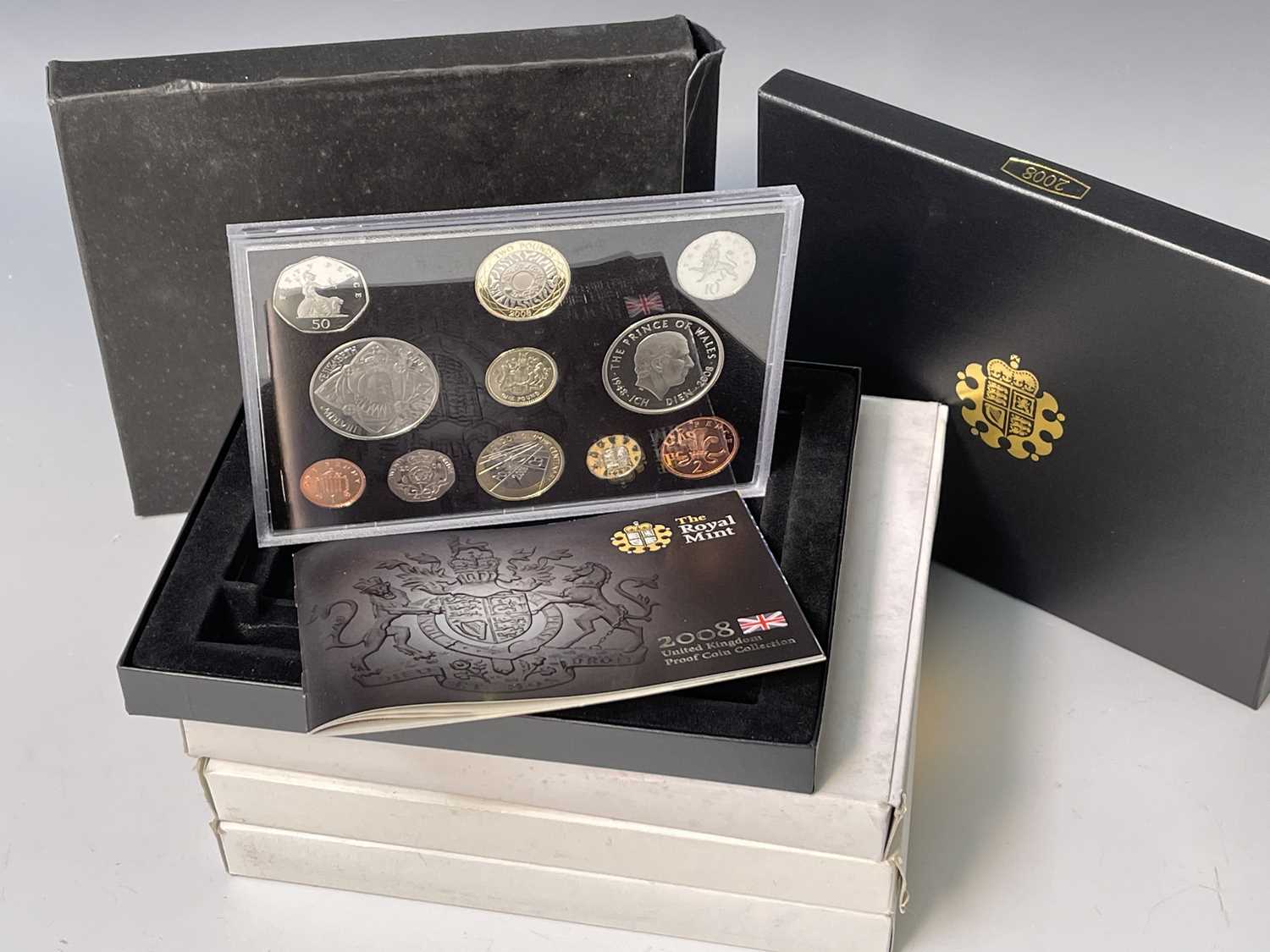 Lot 39 - 2005-2008 UK Royal Mint coin set all in boxes...