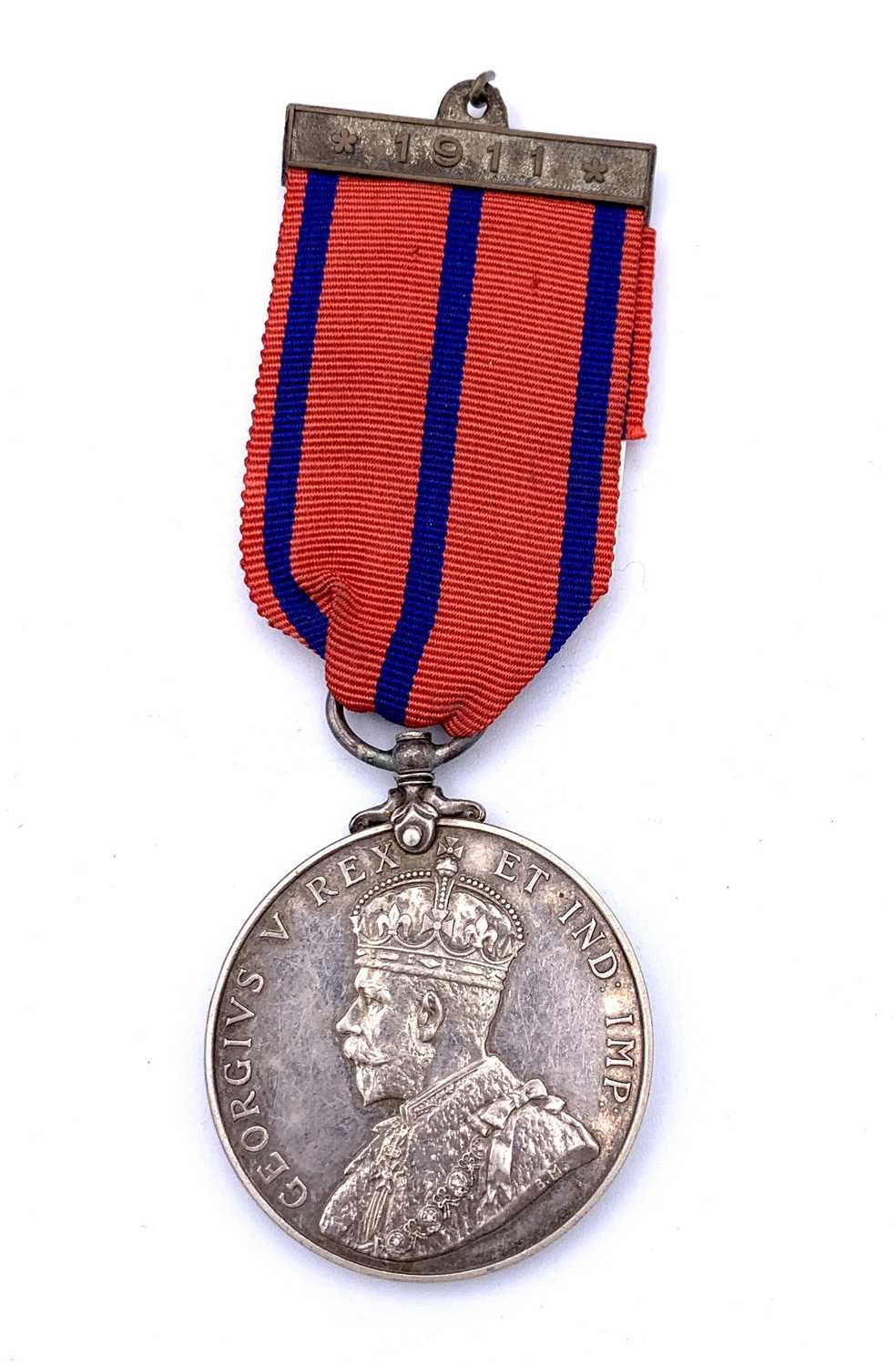 Lot 130 - Metropolitan Police 1911 Medal. A silver 1911...