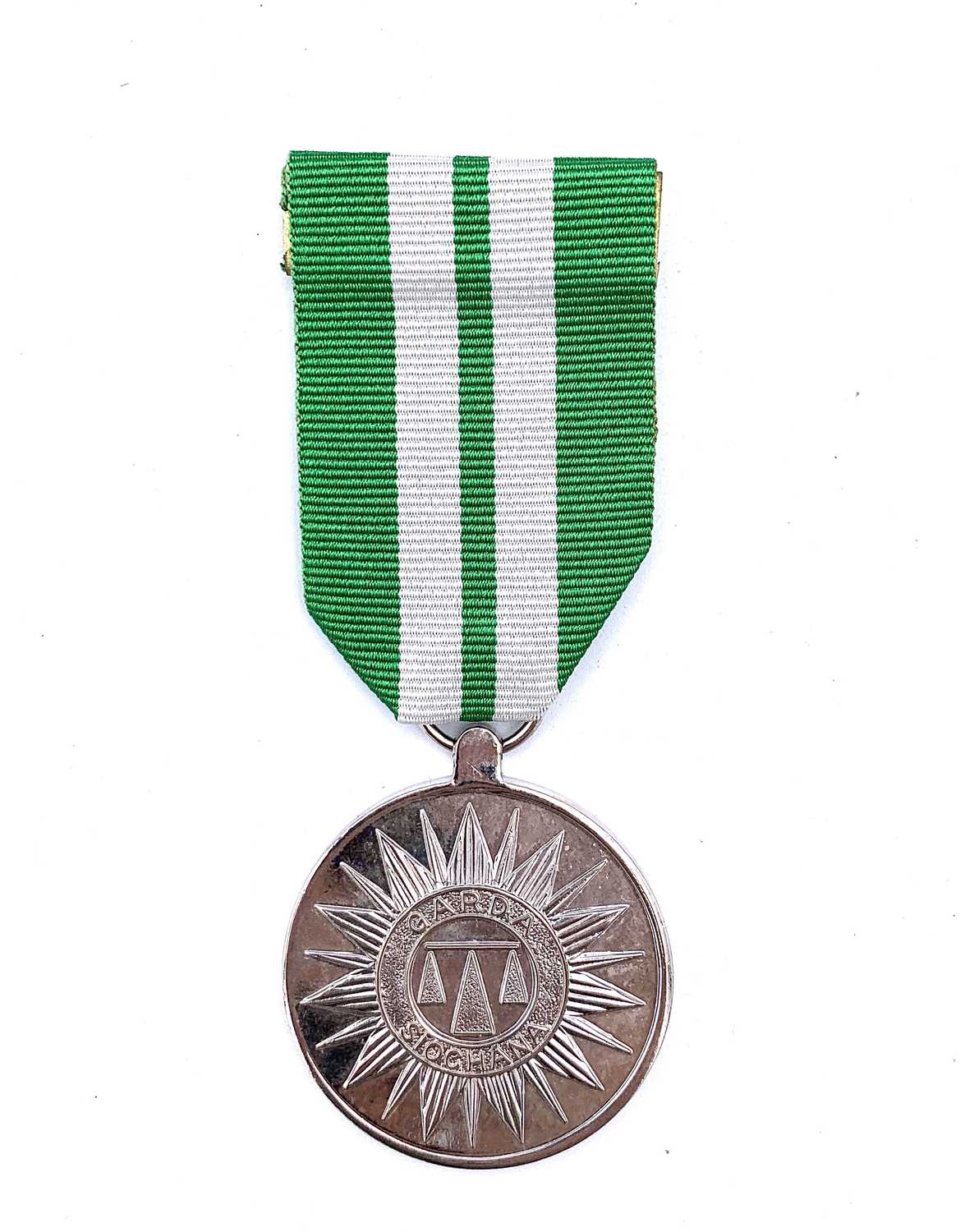 Lot 139 - Irish Garda Long Service Medal. A Garda...