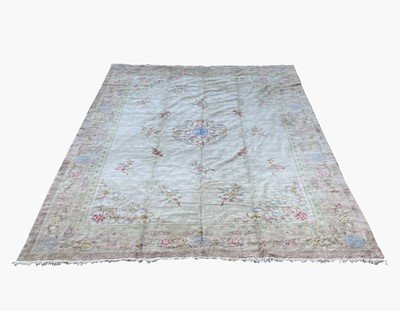 Lot 1215 - A large Chinese carpet, 20th century, with a...