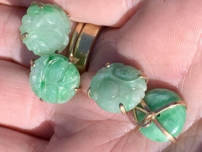 Lot 369 - A pair of 9ct gold mounted jade cufflinks...