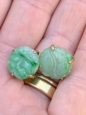 Lot 369 - A pair of 9ct gold mounted jade cufflinks...