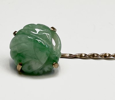 Lot 369 - A pair of 9ct gold mounted jade cufflinks...