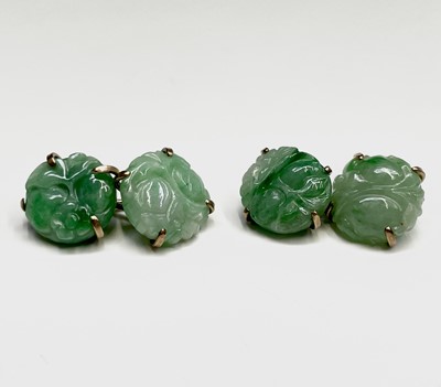 Lot 369 - A pair of 9ct gold mounted jade cufflinks...