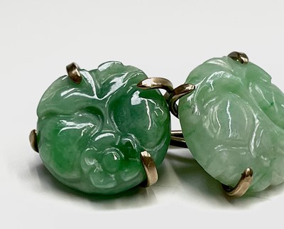Lot 369 - A pair of 9ct gold mounted jade cufflinks...