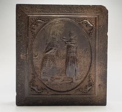 Lot 129 - An Ambrotype of a Victorian lady, heightened...