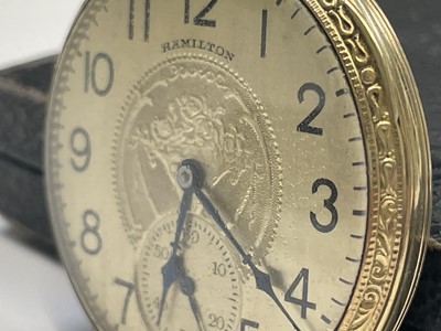 Lot 27 - A gold-plated Hamilton keyless pocket watch...