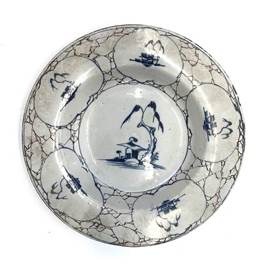 Lot 802 - A Bristol Delft plate, circa 1770, painted in...