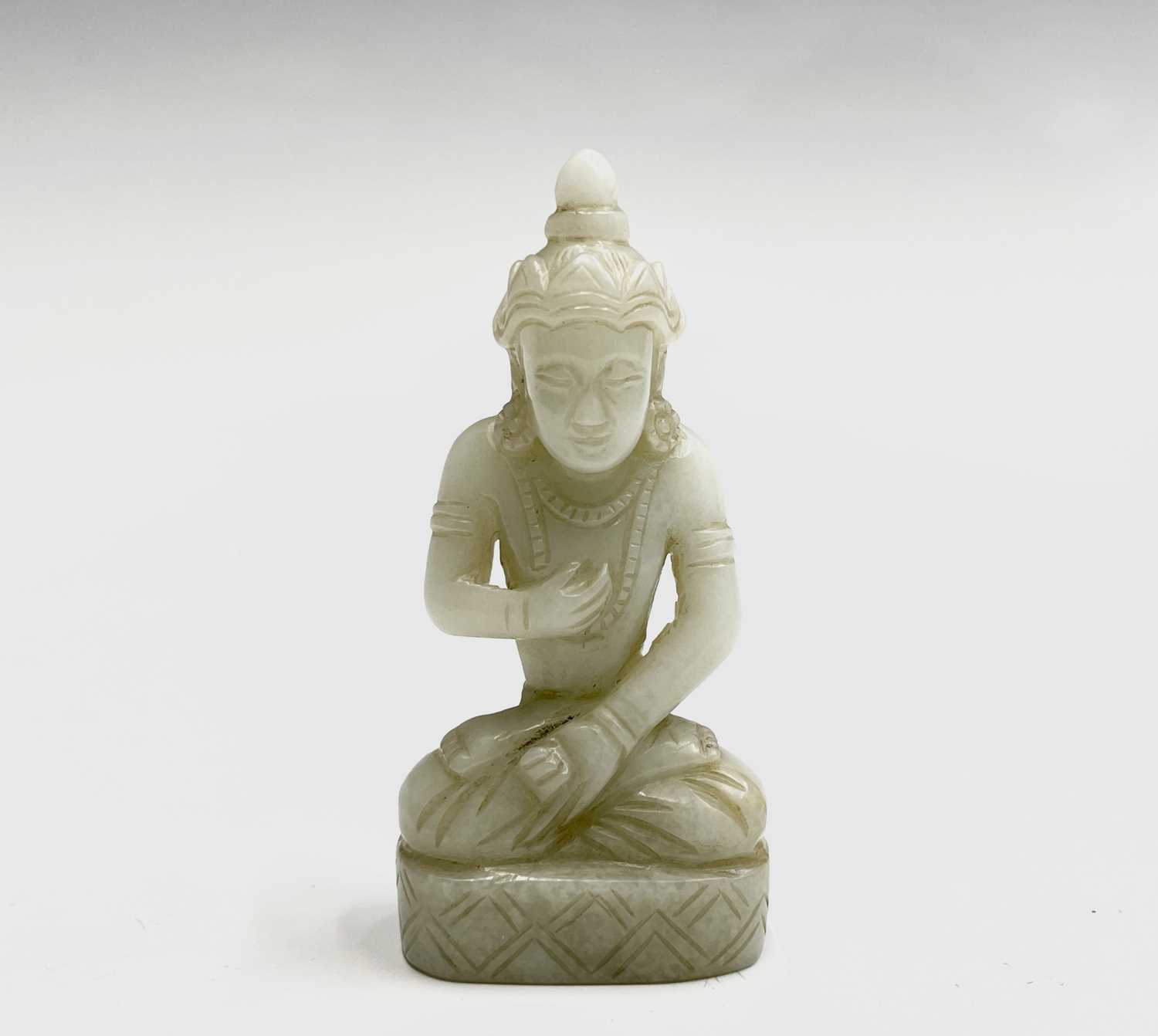 Lot 236 A Chinese carved white jade miniature figure