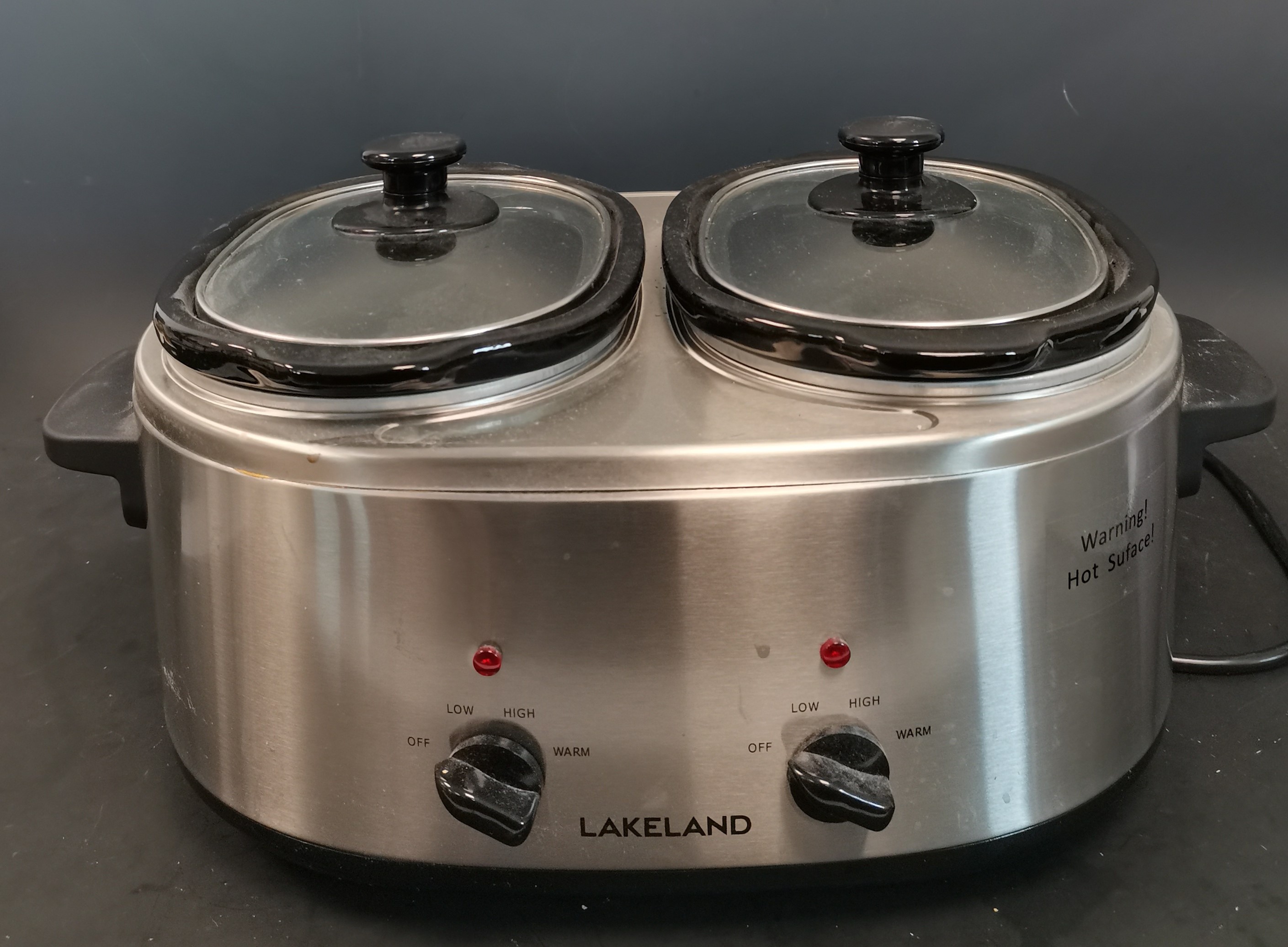 Lot 198 A Lakeland two pot slow cooker.