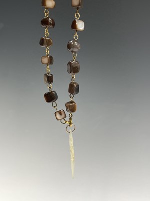 Lot 430 - Fourteen rosary bead necklaces, all with...