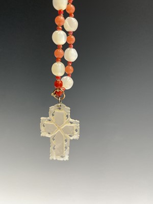 Lot 430 - Fourteen rosary bead necklaces, all with...