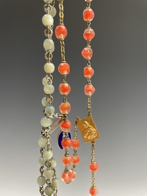 Lot 430 - Fourteen rosary bead necklaces, all with...