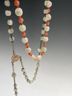 Lot 430 - Fourteen rosary bead necklaces, all with...